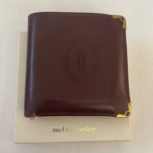 CARTIER VINTAGE CC EMBOSSED LEATHER BURGUNDY BIFOLD wallet